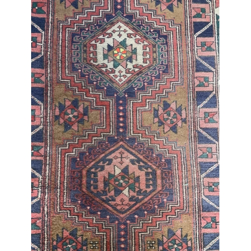 1739 - Good afghan runner, three medallion design, 211cm x 95cm