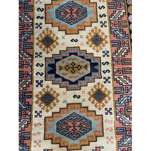 1740 - Turkish three medallion runner, 135cm x 82cm