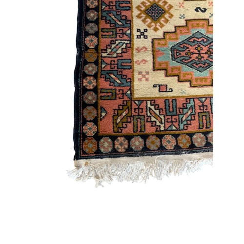 1740 - Turkish three medallion runner, 135cm x 82cm