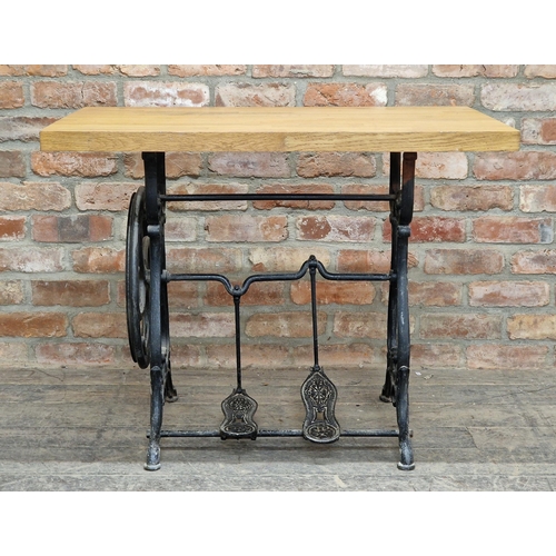 1405 - Vintage sewing machine base converted to a side table with oak top, H 75cm x W 96cm x D 62cm