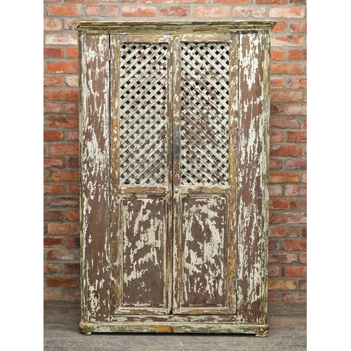 1428 - 18th century Spanish cupboard, with original paint, lattice panel doors enclosing a shelved interior... 