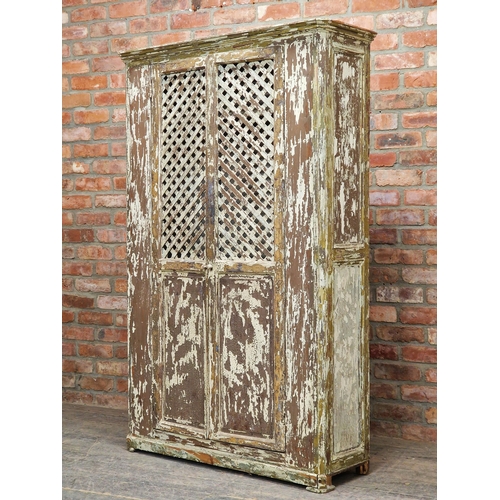 1428 - 18th century Spanish cupboard, with original paint, lattice panel doors enclosing a shelved interior... 