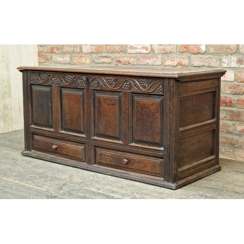 1206 - Antique oak coffer with carved trailing grapevine frieze over four panels and two drawers to base, H... 