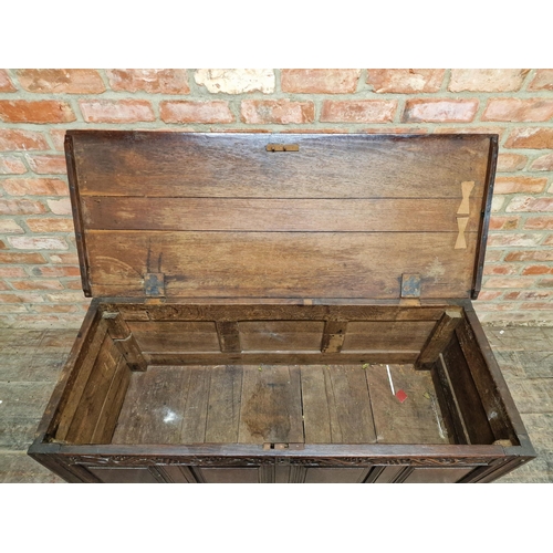 1206 - Antique oak coffer with carved trailing grapevine frieze over four panels and two drawers to base, H... 