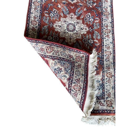 1758 - Keshan rug, floral design, burnt red ground, 125cm x 70cm