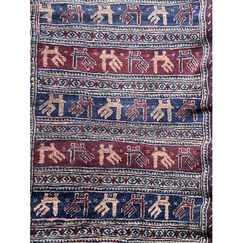 1770 - Persian Qashqai rug, with bands of figures, possibly wrestling,  140cm x 90cm