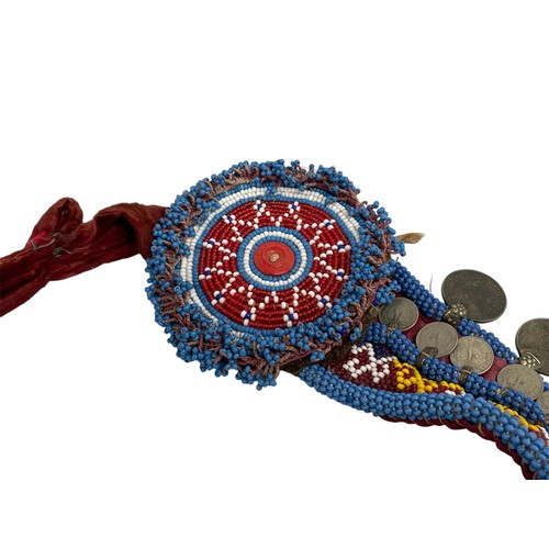 307 - Kuchi beaded & tasseled coin necklace, the large pendant with jewelled effect detail