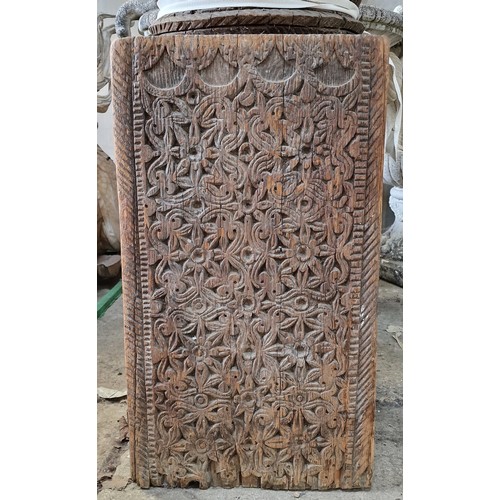 318 - Monumental Indian teak architechtural column, profusely carved all over with flowers, wrythen flutin... 