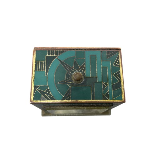 216 - Zenith Art Deco travelling alarm clock in gilt brass rectangular case with enamelled geometric desig... 