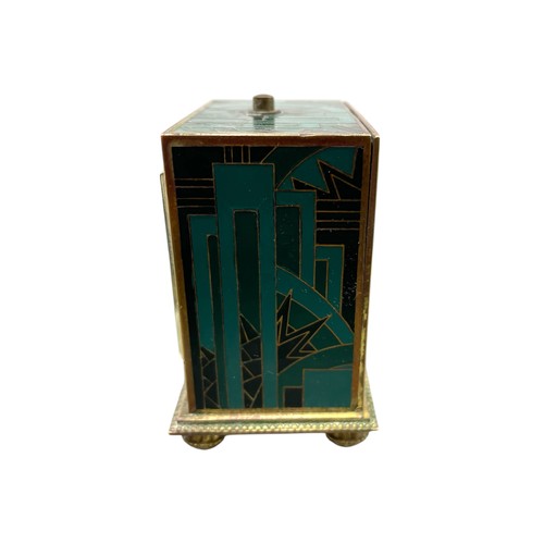 216 - Zenith Art Deco travelling alarm clock in gilt brass rectangular case with enamelled geometric desig... 