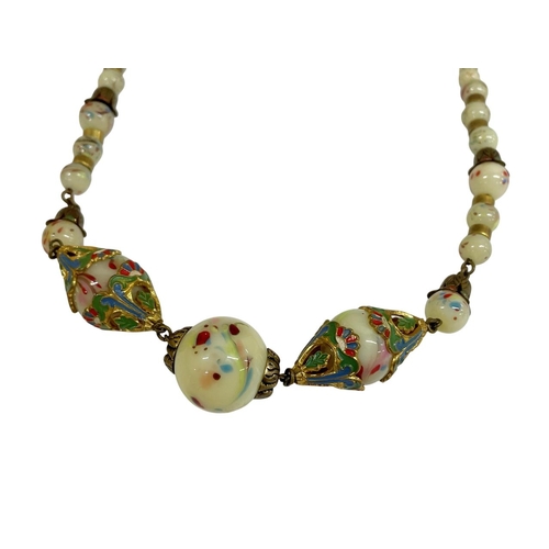 49 - Two interesting Eastern celadon bead necklaces, both enamel mounts and cabochon, 61 and 43cm long re... 