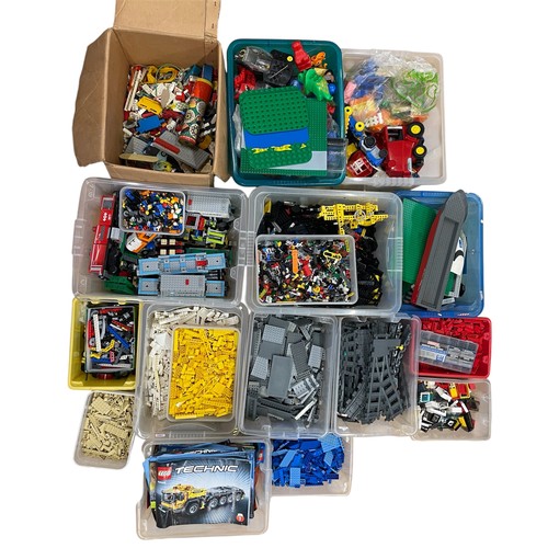 609 - Extensive collection of Lego to include a variety of vehicles / trains and mini figures, featuring L... 