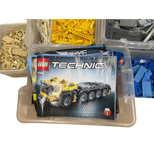 609 - Extensive collection of Lego to include a variety of vehicles / trains and mini figures, featuring L... 