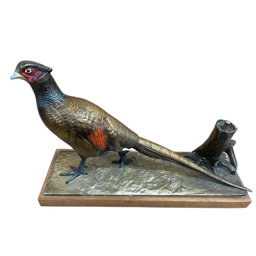 527 - Austrian cold painted spelter table lighter in the form of a pheasant by a tree stump, complete with... 