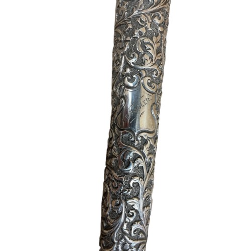 642 - Large antique Indian white metal sword stick, having ornate scrolled acanthus leaf pattern handle wi... 