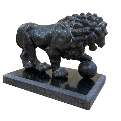 246 - Antique cast bronze Grand Tour lion sculpture with paw atop sphere, held on polished slate base, L 1... 