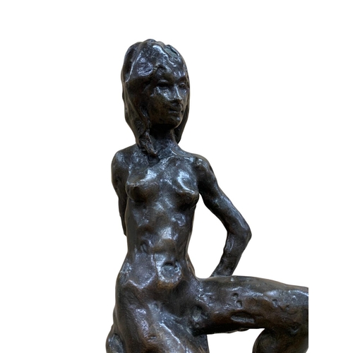 1437 - Enzo Plazzotta (1921-1981) bronze sculpture of sitting nude lady atop draped seat, 'Party Girl', hel... 