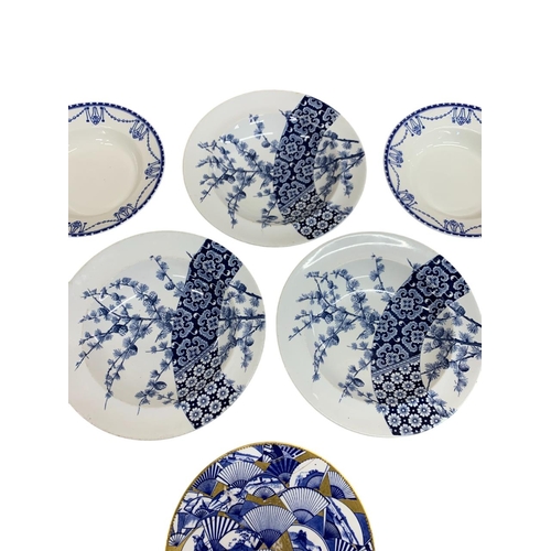 386 - Three Royal Worcester Aesthetic blue floral bowls, with a further collection of blue lace bordered e... 