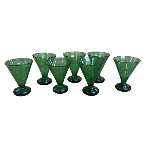 387 - Large collection of hand blown Hebron green glass wine flutes,  H 12cm x D 9.5cm (7)