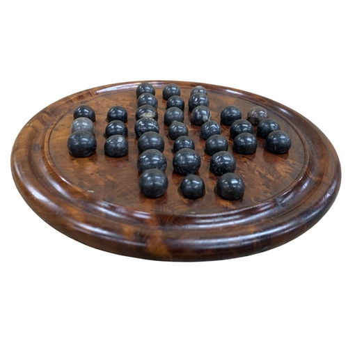 587 - Thuya wood solitaire games board with hand carved black marbles, the tree being a rare aromatic coni... 