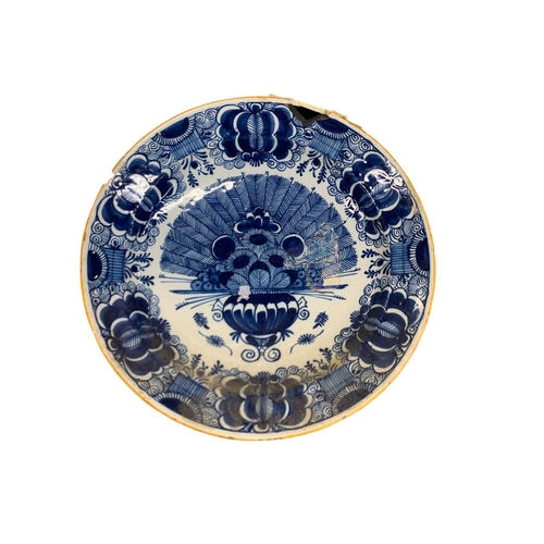 394 - Three 18th century Delft blue and white peacock pattern chargers, D 35cm (3)