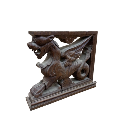 486 - Pair of 18th century carved oak wyvern brackets, 42cm x 35cm x 8cm