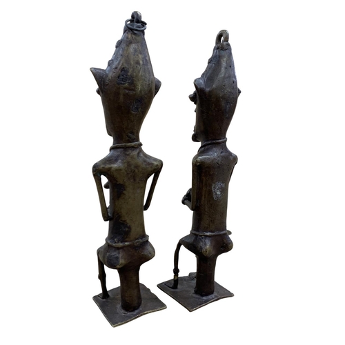 310 - Pair of 19th African tribal bronze Yoruba Ogboni society Edan figures, seated in male and female for... 