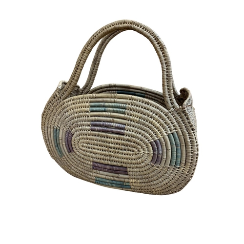 311 - Mixed quantity of African tribal basketry items to include a Western Nigerian woven grass bag, Hausa... 