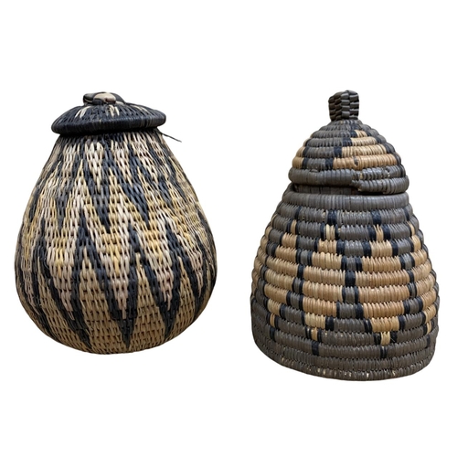 311 - Mixed quantity of African tribal basketry items to include a Western Nigerian woven grass bag, Hausa... 