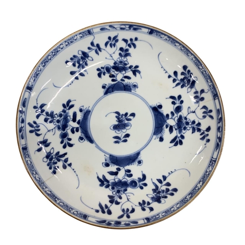 313 - Chinese 18th century Kangxi blue and white floral plate, having brown underglaze to reverse, with a ... 