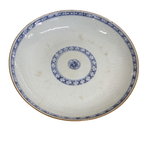 313 - Chinese 18th century Kangxi blue and white floral plate, having brown underglaze to reverse, with a ... 