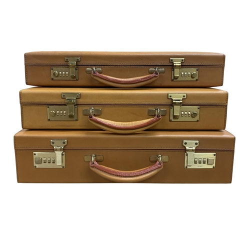 594 - Quantity of three Italian brown leather hard-shell attaché briefcases, having fitted leather interio... 