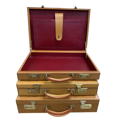 594 - Quantity of three Italian brown leather hard-shell attaché briefcases, having fitted leather interio... 