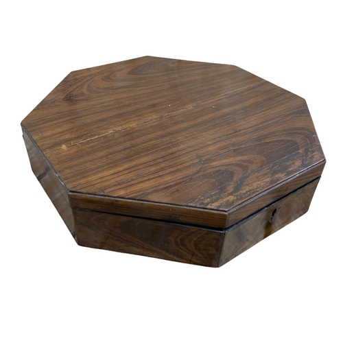 485 - Octagonal Regency mahogany box with marquetry inlay interior lid, having an extensive collection of ... 