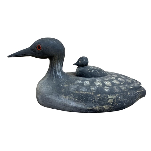 491 - Hand carved American Folk Art wooden decoy duck with duckling, having glass eye decoration to both, ... 