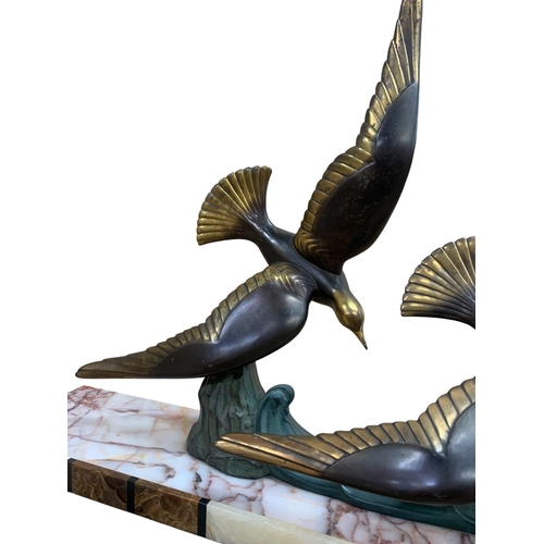 542 - Large Art Deco 1920's cold painted spelter sculpture of two soaring seagulls over crashing waves, ea... 