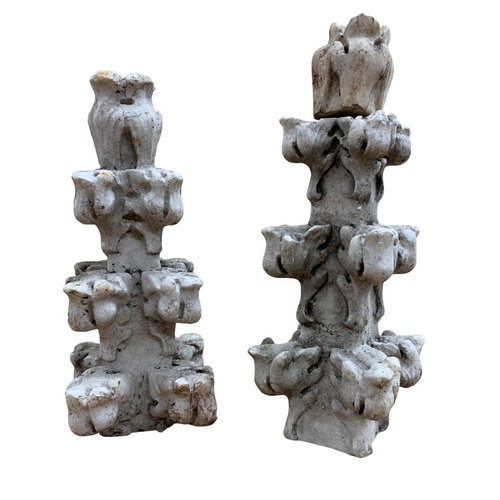 593 - Pair of unusual hand carved marble finials, having applied floral decoration, largest H 22cm