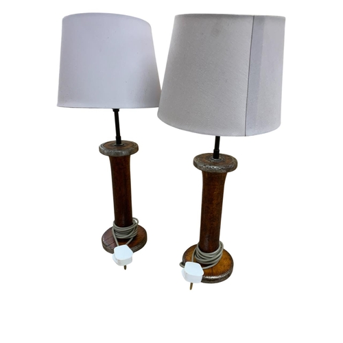 1085 - Mixed quantity of lighting to include a pair of large brass Corinthian column candlesticks, a pair o... 