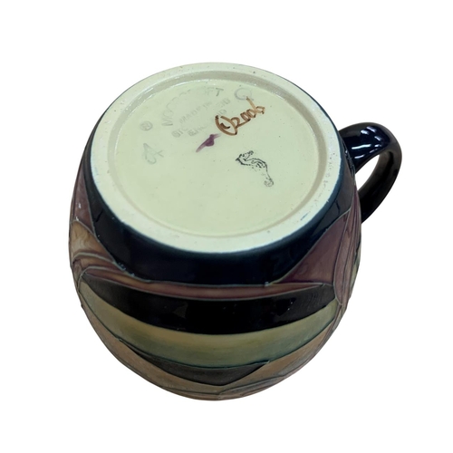 433 - Moorcroft Pottery mug in the Western Isles pattern, stamped to base with Sian Leeper artist monogram... 