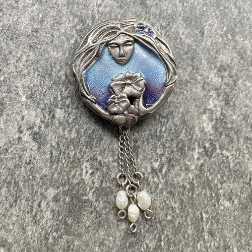 30 - Art Nouveau silver and guilloche enamel brooch in the form of a maiden head and flowers, with three ... 