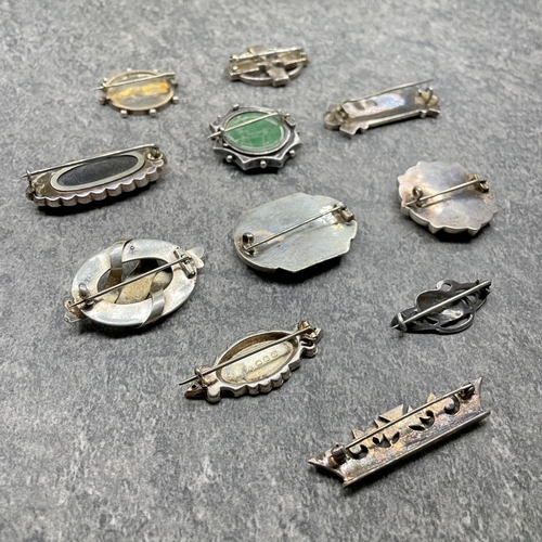 33 - Collection of Aesthetic Movement and antique silver brooches to include Charles Horner and Scottish ... 