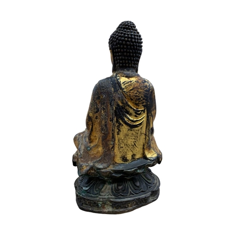 341 - 19th century Chinese gilt metal statue in the form of a seated Buddha holding a pagoda, H 19cm