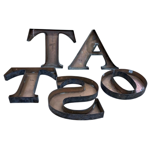 1012 - Quantity of copper shop front sign letters, 'T', 'O', 'A', 'S', 'T', tallest approx 39cm. (5)