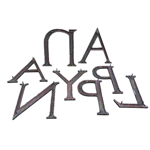 1013 - Quantity of bronze shop front sign letters, 'P', 'L', 'A', 'Y', etc, approx 30cm H. (8)