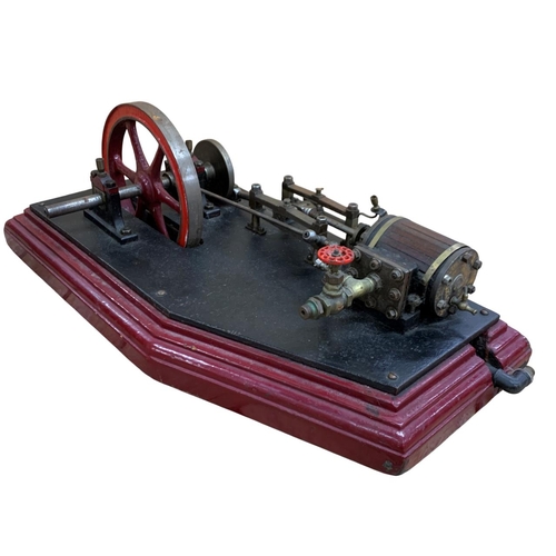 614 - Single cylinder horizontal stationery steam engine with 8 inch fly wheel, together with a vertical b... 