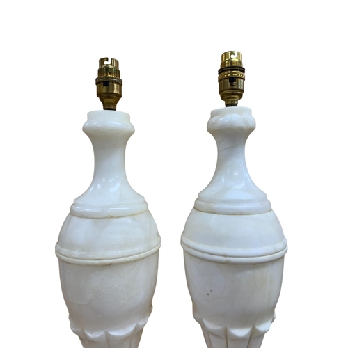 1098 - Pair of white marble table lamps of baluster form raised on pedestal bases, H 56cm