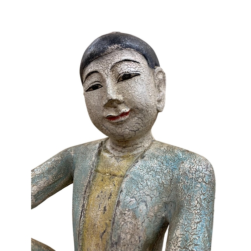 348 - South East Asian polychrome painted wooden seated figure, possibly Burmese, H 32cm