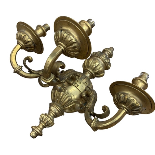 1096 - Pair of heavy cast brass three branch wall lights with scrolling acanthus details, H 37cm x W 36cm