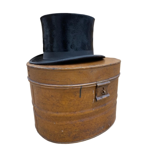 612 - Quantity of antique top hats to include a Wheelers of London and a silk example, together with a Tre... 