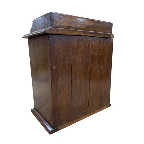 501 - Antique mahogany four draw specimen/collectors cabinet with stepped rectangular top, H 42cm x W 36cm... 